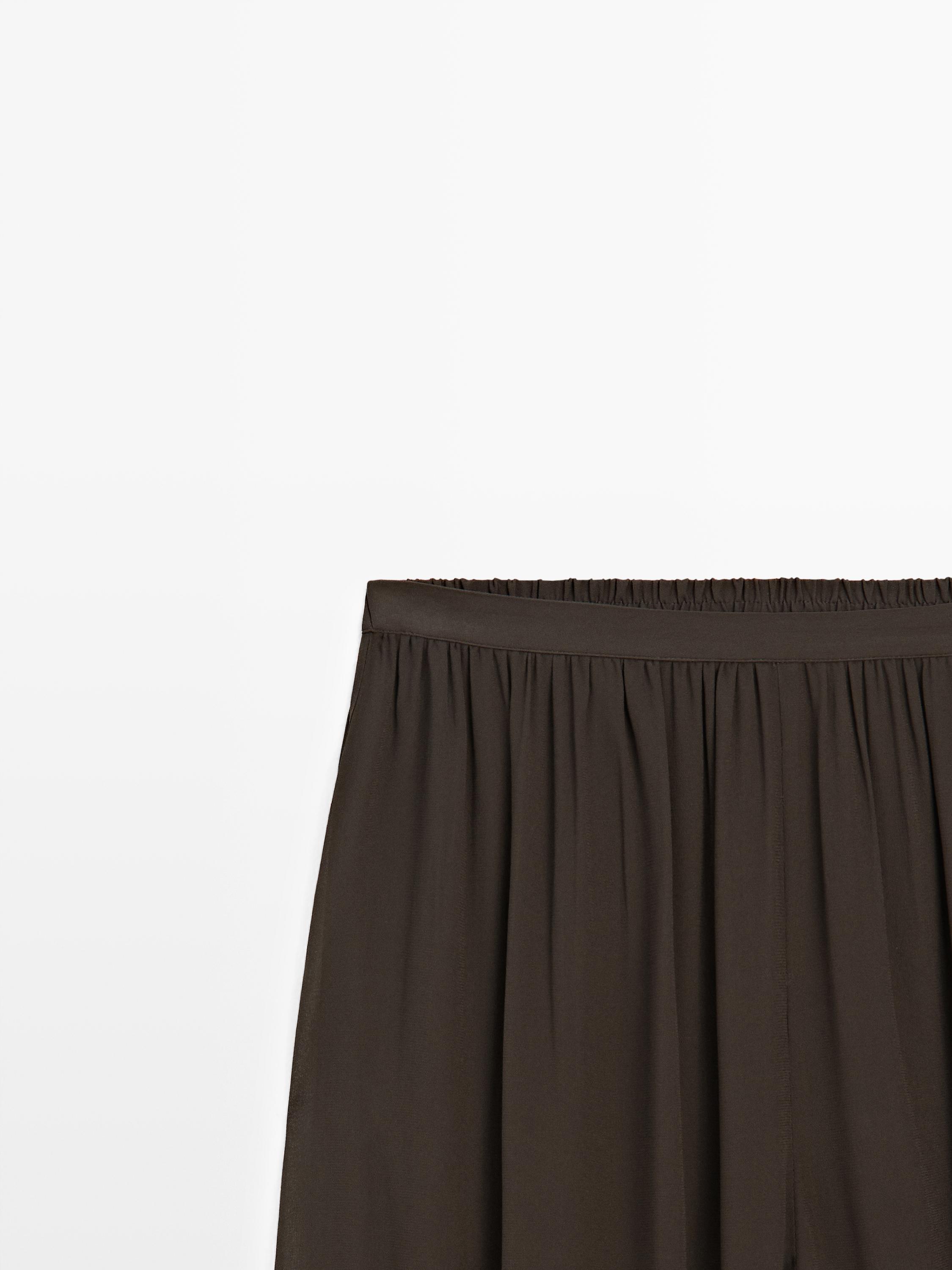Pantalon bouffant semi-transparent avec boutons
